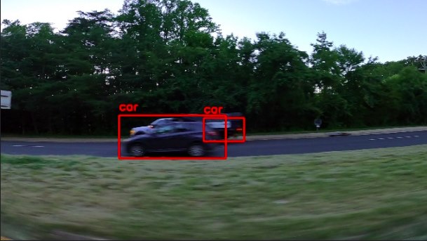 Two vehicles on a road with bounding boxes labelled car, produced by the detection stage.